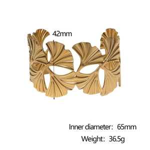 Detail of 18K gold plated ginkgo leaf open bangle with 65mm inner diameter dimensions