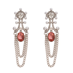 Vintage silver tassel earrings with red gemstones, pearls, and crystals on a white base