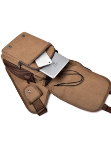 Brown canvas messenger bag with multiple compartments and adjustable strap for men