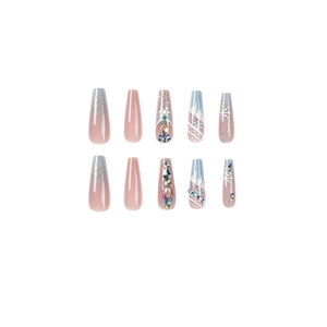 Blue and pink snowflake press-on nails with silver glitter and rhinestone accents