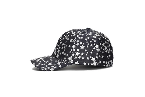 Detail of navy baseball cap with white pentagram star pattern and curved brim