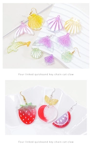 Detailed view of DIY resin earring charms featuring starfish and fruit shapes in vibrant colors