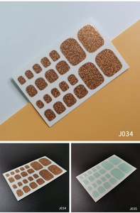 Detail view of J034 bronze and J035 light blue glitter toe nail polish wraps 22 tips set