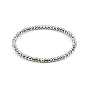 Macro shot of silver beaded stainless steel bracelet with polished spherical design