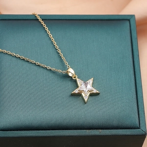 Elegant gold titanium steel necklace with a sparkling double-layer star-shaped pendant