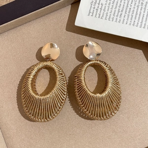 Bohemian gold woven textured oval pendant earrings with minimalist round stud