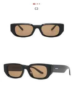 Dual-angle view showing thick black frames with tea lenses and silver temple accents