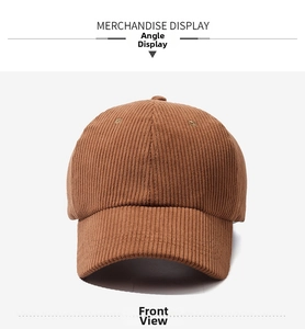 Detailed front view of dark brown corduroy baseball cap with vertical ribbed texture