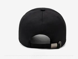 Detail view of the black baseball cap rear with an adjustable metal buckle strap