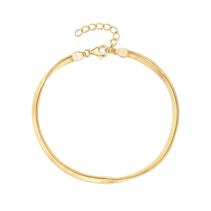 Detail of 925 sterling silver snake chain bracelet with gold plating and lobster clasp