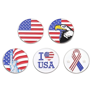 Five American flag themed enamel badges including bald eagle and Statue of Liberty designs