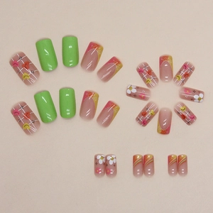 Rainbow press-on nails with green, plaid, floral and heart patterns for a summer style
