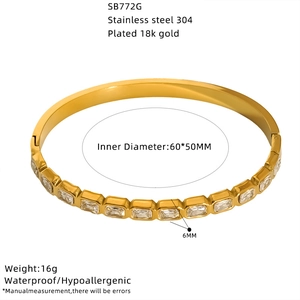 Detail view of 18K gold plated stainless steel bangle with rectangular zircon stones