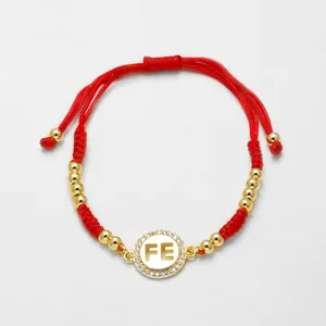 Rotes geflochtenes Armband mit goldenem Zirkonia-Herz und verstellbarem FE-Anhänger