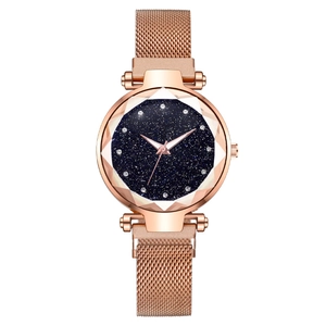 Women's rose gold starry sky quartz watch with Milanese mesh magnetic strap and cut glass