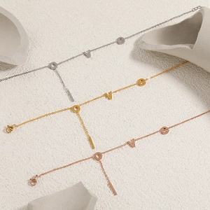 Minimalist LOVE letter anklet in gold, silver, and rose gold stainless steel finishes