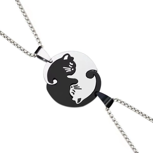 Minimalist black and white cat couple necklaces forming a round puzzle on box chains