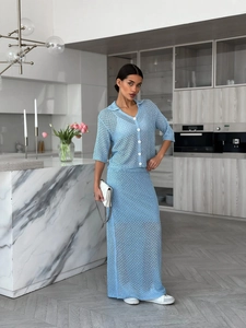 Blue hollow knit two-piece set featuring short-sleeve cardigan and high-waist maxi skirt