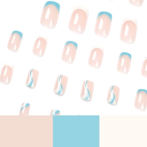 Press-on nails featuring French blue and white wavy lines and minimalist patterns