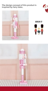 Detailed views of a 38cm pink glitter wooden nutcracker soldier with a scepter