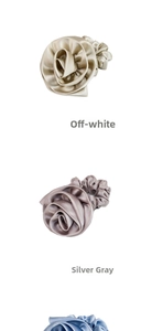 Detailed view of cream white and silver gray oversized satin rose flower hair scrunchies