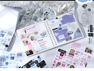 Flat lay of retro English deco stickers for DIY journaling with pastel color accents