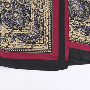 Chic paisley print wrap dress in silk-like satin with vintage red and blue patterns