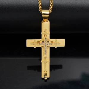 Gold layered Celtic cross necklace with cubic zirconia on a sturdy Cuban chain link