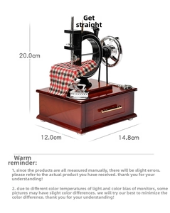 Macro view of vintage sewing machine music box with detailed dimensions 20x14.8x12.0cm