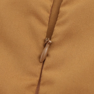 Close-up of invisible zipper detail on brown coconut tree embroidered sleeveless H-line dress