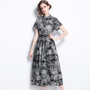 Elegant black and white toile de jouy dress with collar and belt in full length view