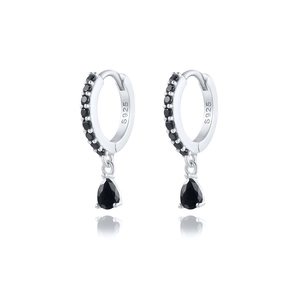 Macro detail of S925 sterling silver stamp and black teardrop crystal on hoop earrings