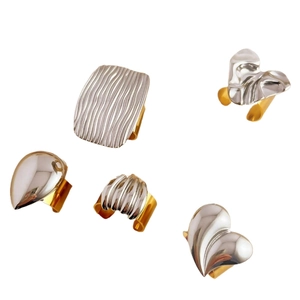 Five-piece stainless steel ring set with 18K gold and silver two-tone geometric designs