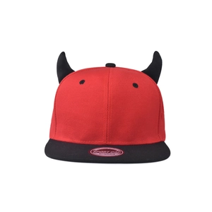 Detail view of the creative 3D black devil horns on a red hip hop snapback cap
