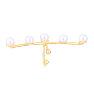 Detailed view of elegant gold ear cuff featuring five round white pearls in a curved design