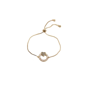 Close-up of heart charm with colorful zircon and adjustable gold-plated chain