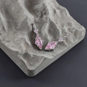 18k rhodium plated earrings with marquise cut pink zircon on natural grey stone