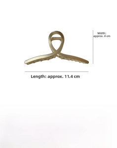 Detailed size chart showing dimensions for small and large metal flower hair claws