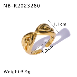 Detail view of twisted gold rope ring showing 1.1cm width and 5.9g weight specifications