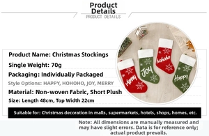 Detail of plush Christmas stockings showing red and green fabrics with snowflake embroidery