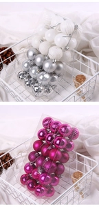 Detail of 4cm Christmas balls in white and pink with matte, glitter and spiral finishes