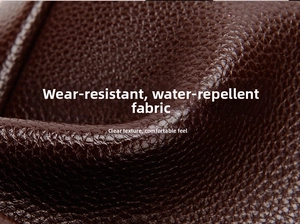 Detail of dark brown water-resistant leather with wear-resistant grainy texture