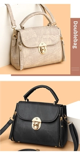 Close-up of beige printed and black handbags with gold twist locks and top handles