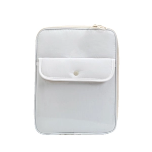 Quilted padded tablet sleeve in light grey with front snap pocket and dual zippers