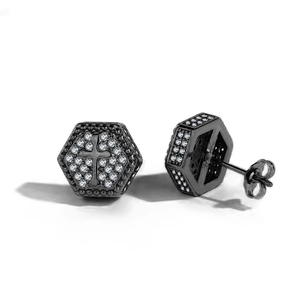 Macro shot of gun black hexagonal stud earrings with cross design and pavé cubic zirconia