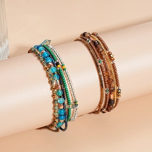 Meerlagige bohemian kralenarmband set met glasagaat en metalen accenten