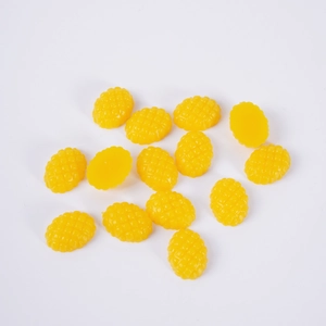 Miniature resin mango cubes for DIY miniature food art on a white background