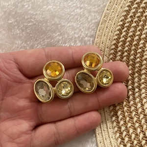 Elegant vintage gold geometric earrings with amber and champagne colored crystals