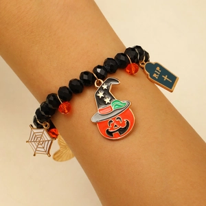 Pulsera de Halloween con dijes de calabaza y fantasma en cuentas negras elásticas