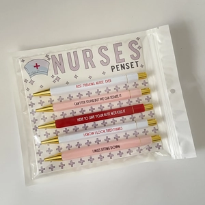 Detail of 5-piece nurse theme ballpoint pen set with funny quotes on card packaging